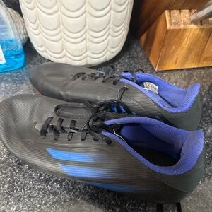 Black and Blue Adidas cleats